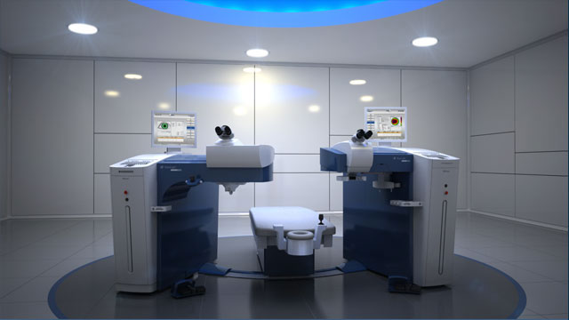Bloc de chirurgie réfractive équipé de la suite Alcon WaveLight : le laser femtoseconde FS200 et le laser excimer EX500 disposés autour d'un lit patient pivotant